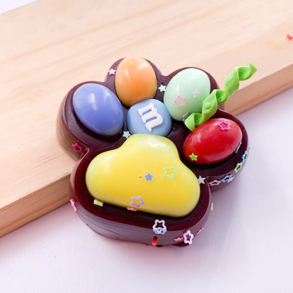 Taba Squishy Patinha M&M - UND