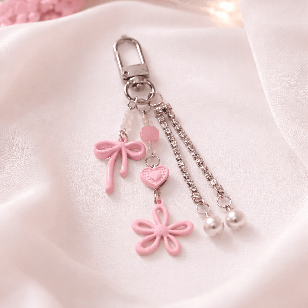 Chaveiro Tendência Charm Flor Lacinho  - IMPORTADO - UND