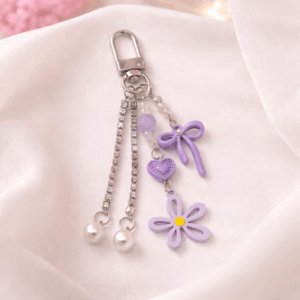 Chaveiro Tendência Charm Flor Lacinho  - IMPORTADO - UND