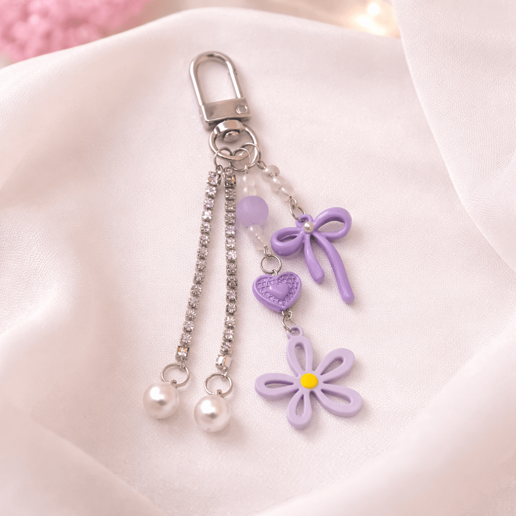 Chaveiro Tendência Charm Flor Lacinho  - IMPORTADO - UND