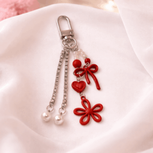 Chaveiro Tendência Charm Flor Lacinho  - IMPORTADO - UND