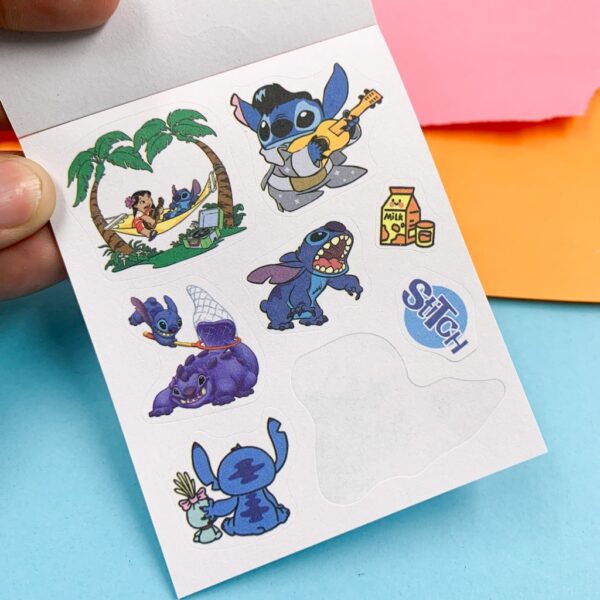 PROMO - Caderninho de Adesivos STITCH 12 Folhas - UND - FALTANDO 2 ADESIVOS