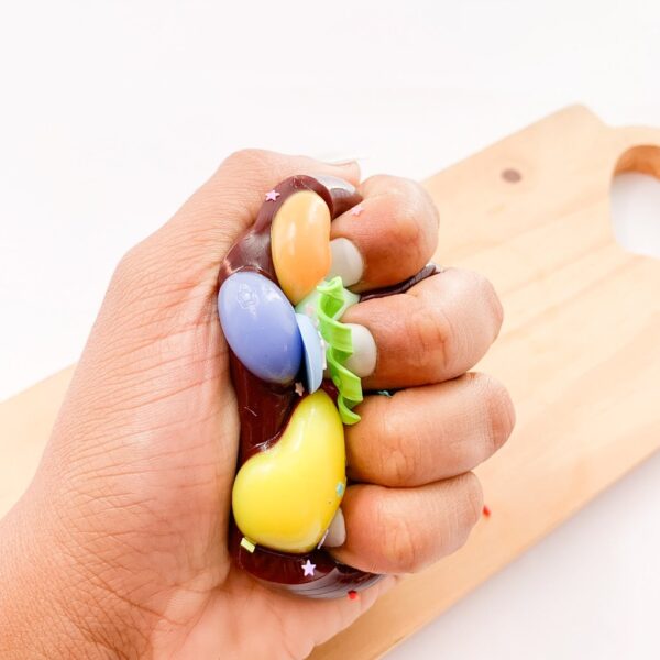 Taba Squishy Patinha M&M - UND